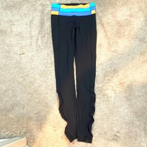 Size 2 Lululemon black pants with side pockets.